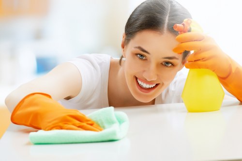 Carpet cleaning technician preparing equipment before service